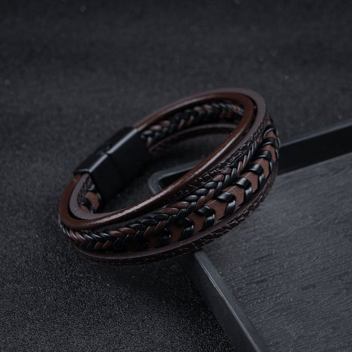 Gift for him: Men's braided leather Viking bracelet. Features a magnetic clasp, perfect for a strong look.