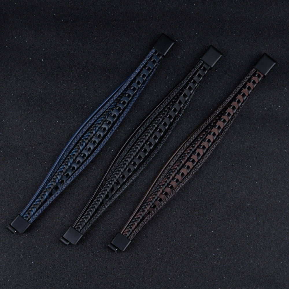 Textured men's braided leather bracelet, a durable Nordic accessory. Magnetic clasp for ease and security.