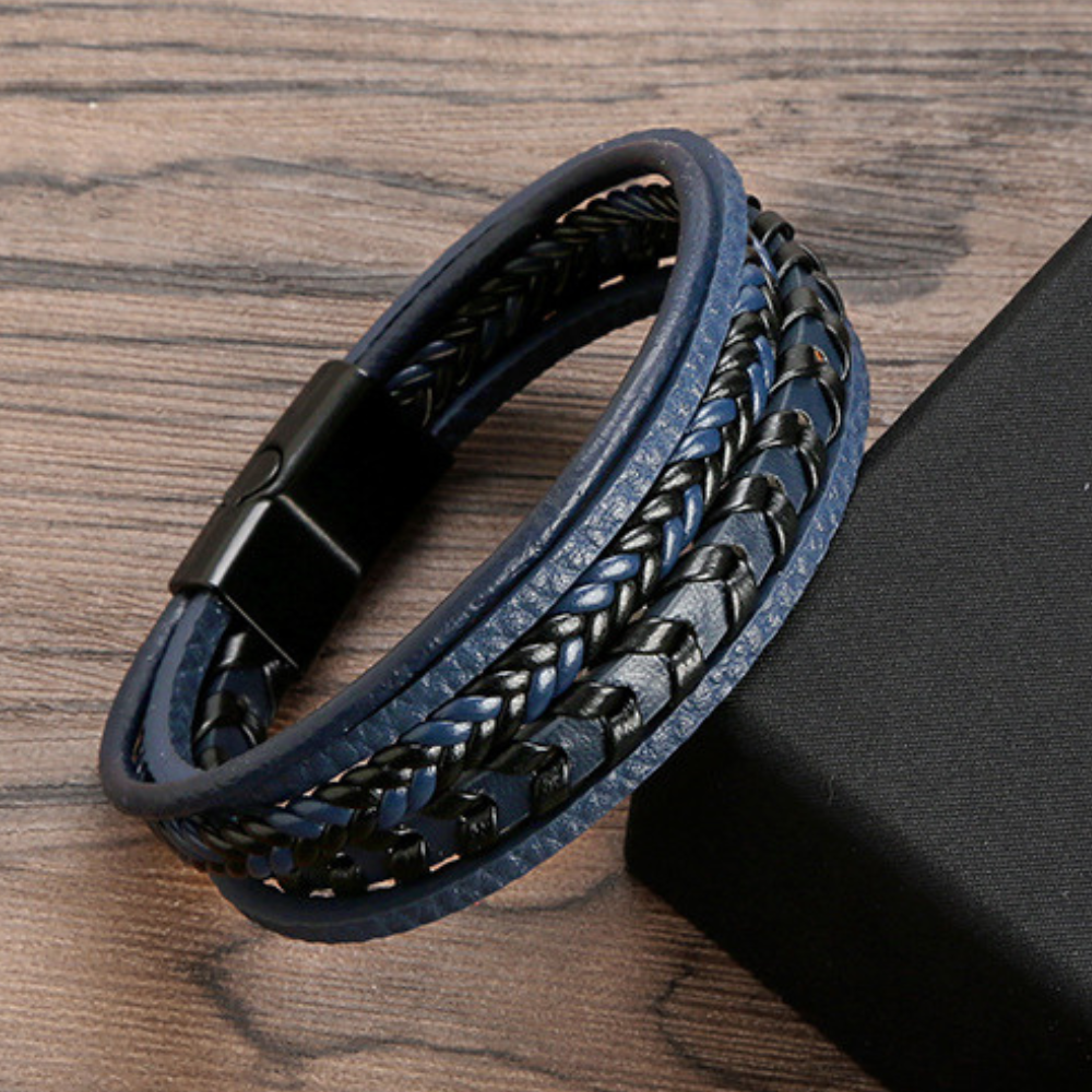 Durable men's leather bracelet, intricately braided with a secure magnetic closure. Ideal Nordic accessory.
