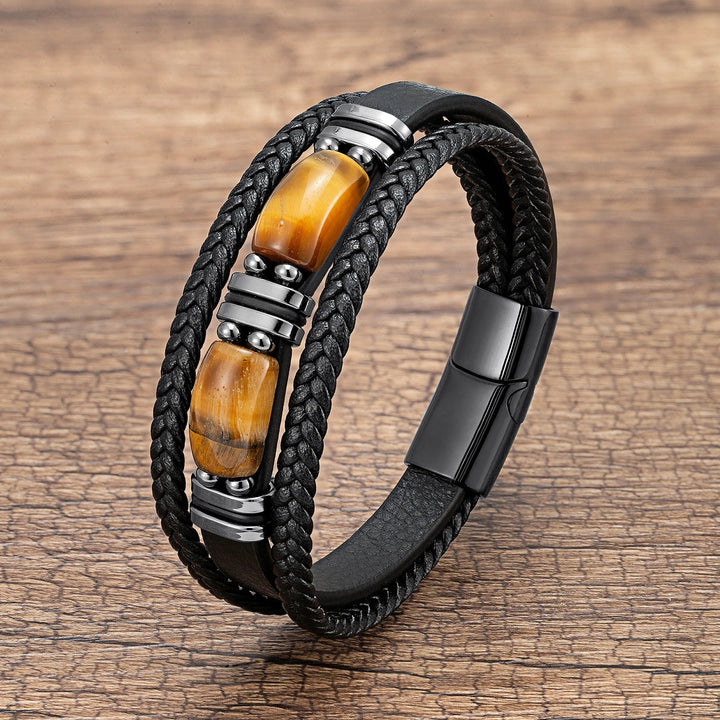 Stylish men's braided leather and tiger eye gemstone bracelet. A unique fashion accessory for men.