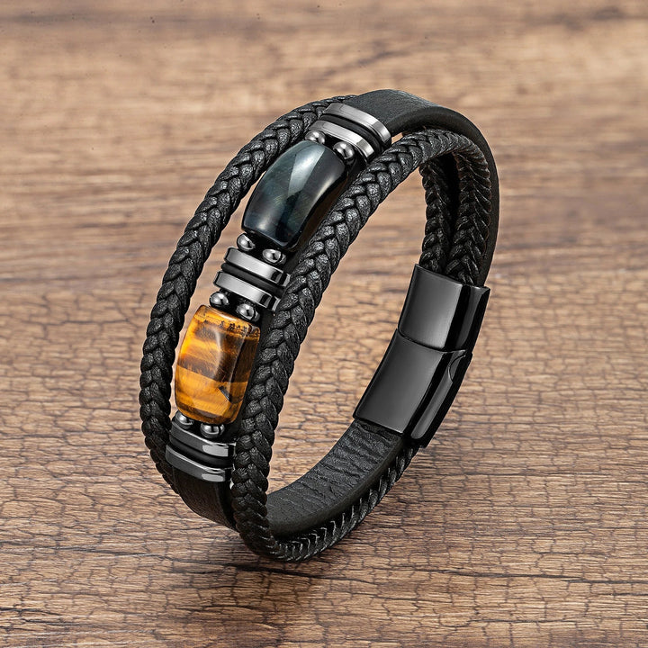Close-up of a men's tiger eye bead bracelet, showcasing the intricate braided design and stone detail.