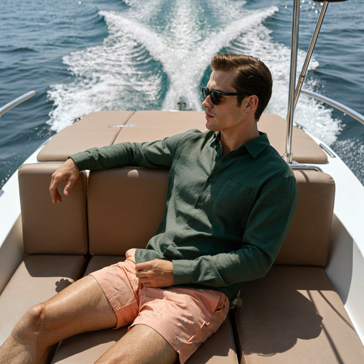 Men's relaxed fit breathable button-down shirt on hanger, ideal for summer fashion & comfort.