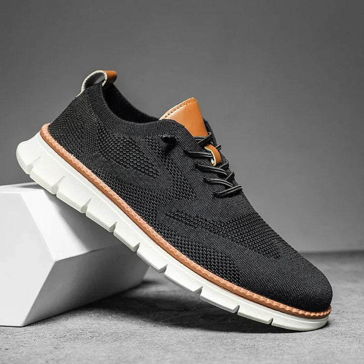 Side view of casual men's trainers with a durable chunky sole