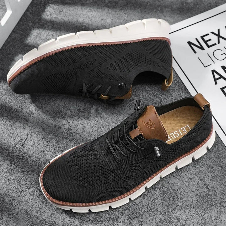 White chunky sole detail on men's summer knit trainers
