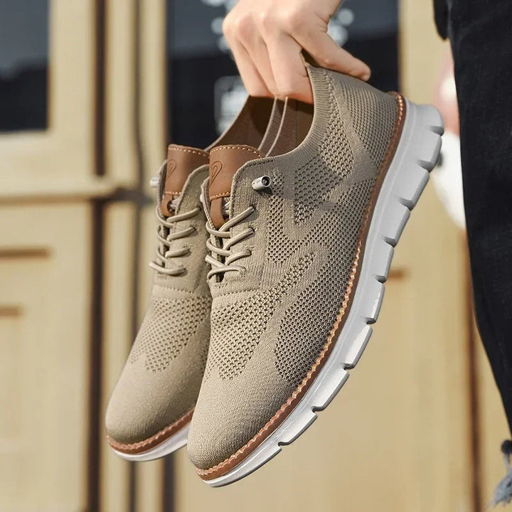 Pair of men's breathable knit trainers, ideal for warm weather