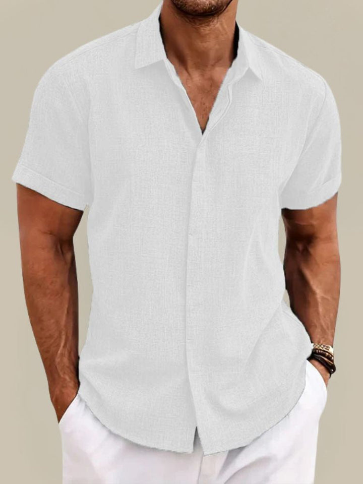 Classic men's linen button-up shirt, offering a relaxed summer casual style