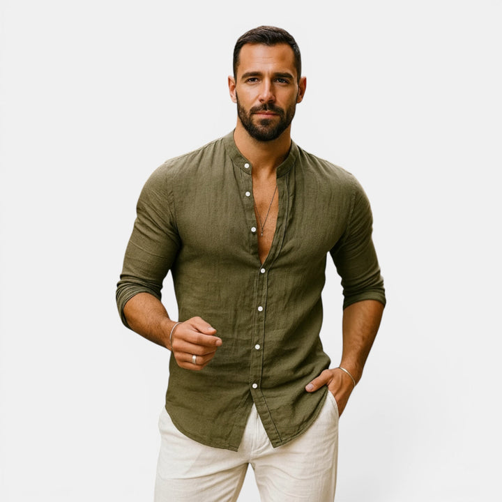 Lightweight men's long sleeve button-down shirt. Breathable, relaxed fit, perfect for summer beachwear.