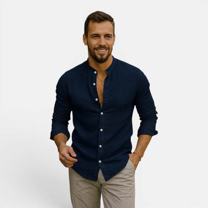 Men's lightweight button-down long sleeve shirt, breathable, relaxed fit. Great for casual summer or beach.