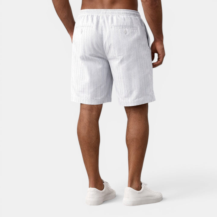Stylish regular fit men's summer shorts, perfect for beachwear and vacation.