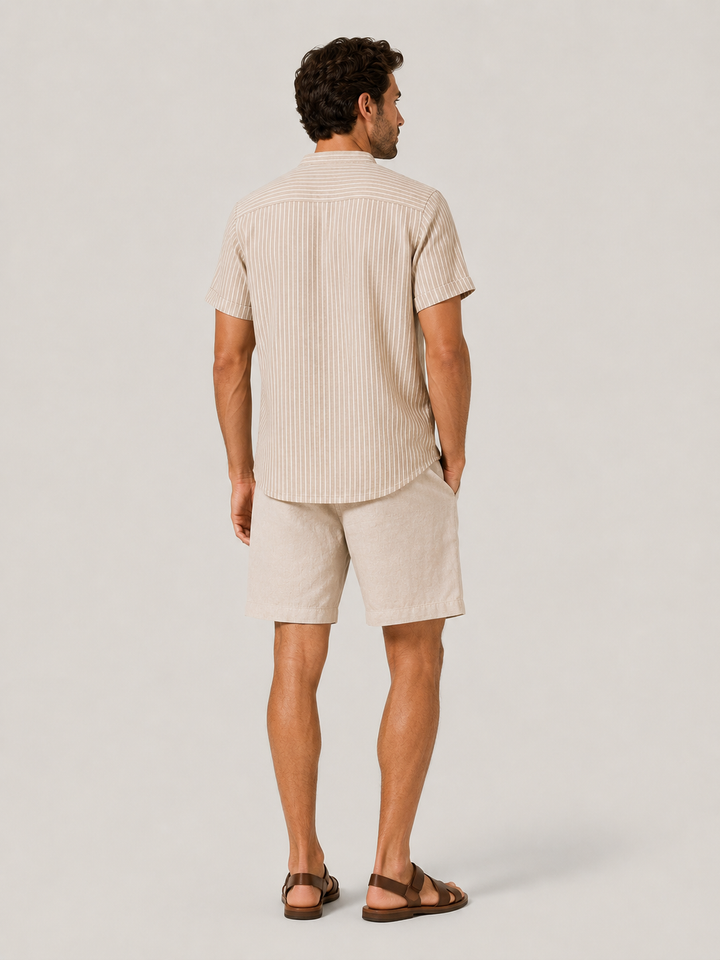 Lightweight striped men's summer shirt, breathable fabric, relaxed fit henley, great for casual wear.