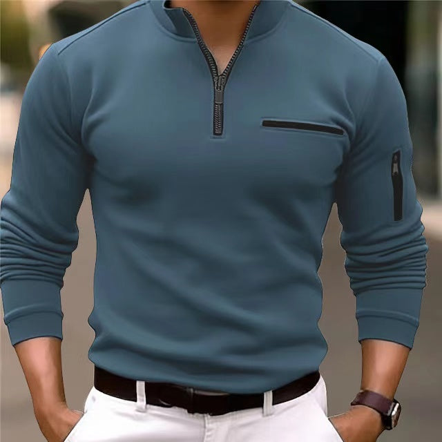 Front view of a men's everyday essential zip-up sweater in a charcoal gray.