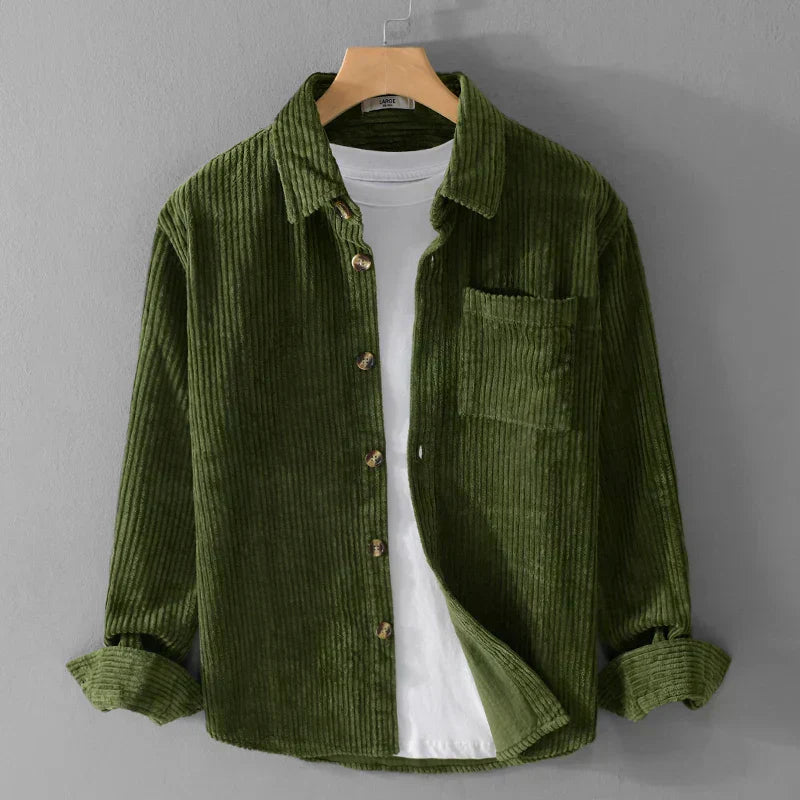 Man wearing a smart casual men's corduroy shirt, perfect for winter fashion.
