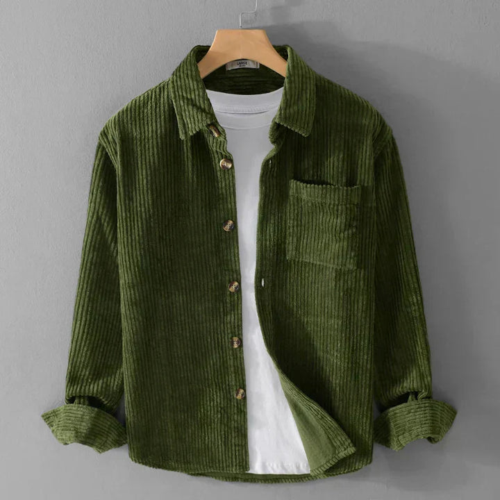 Man wearing a smart casual men's corduroy shirt, perfect for winter fashion.