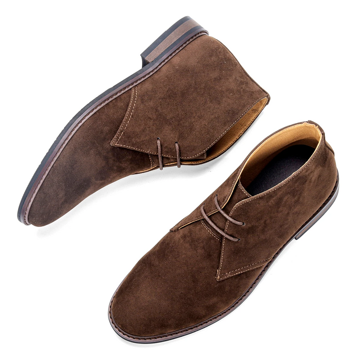 Casual brown chukka boots for men, ideal for work or weekend wear.