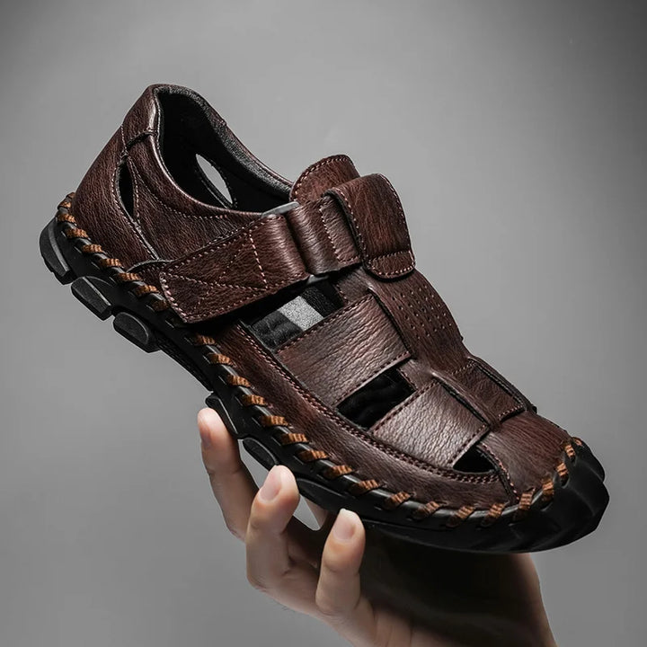 Men's brown leather fisherman sandals with adjustable hook-and-loop strap