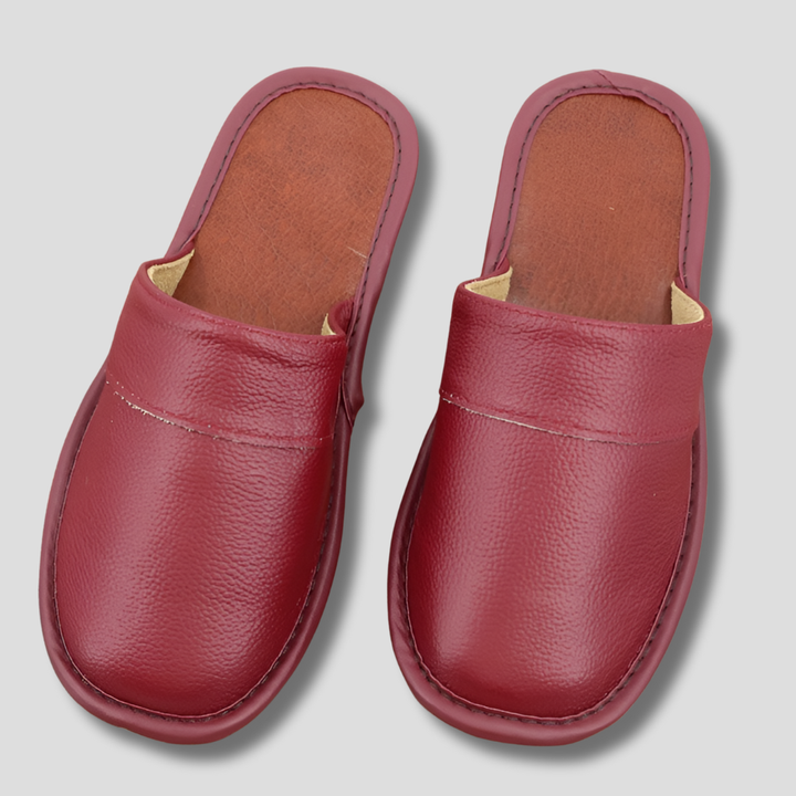 Men's brown leather house slippers, comfortable slip-on indoor footwear.