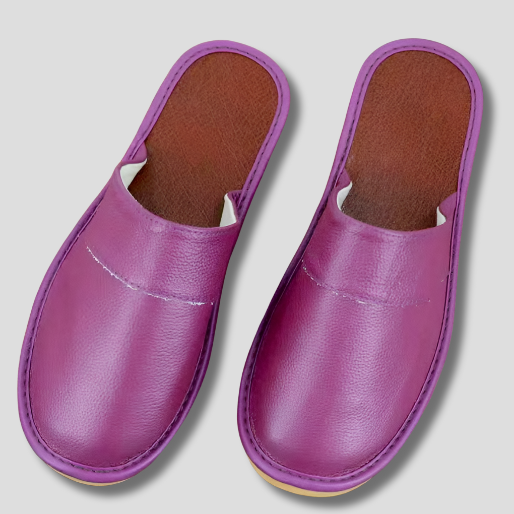 Men's versatile leather slippers, stylish and comfortable indoor footwear.