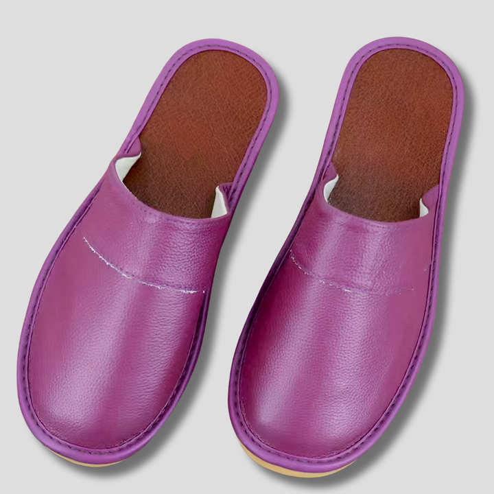Men's versatile leather slippers, stylish and comfortable indoor footwear.