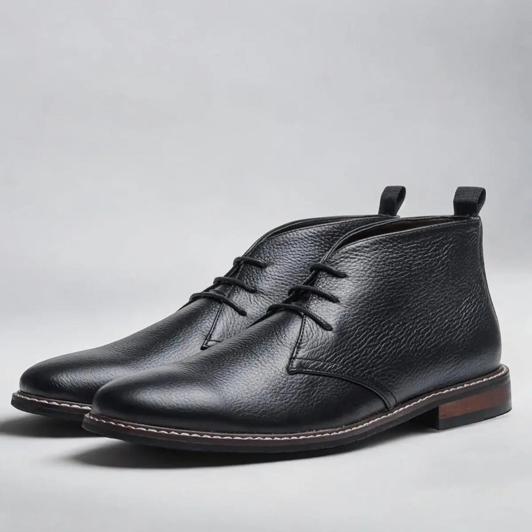 Black lace-up chukka ankle boots for men. Stylish smart-casual everyday boots, essential for mens fashion.