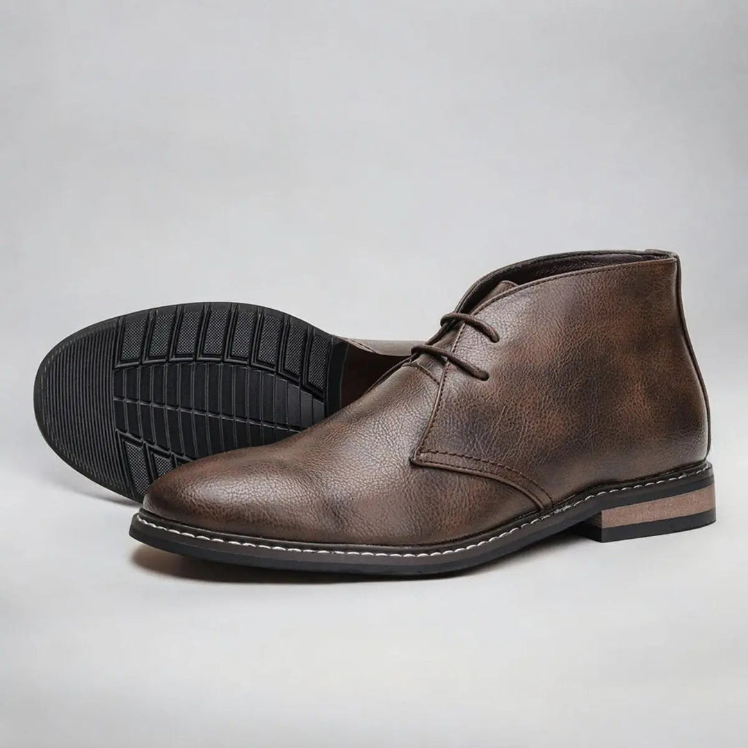 Versatile men's lace-up chukka ankle boots. Smart-casual leather footwear in brown, ideal for everyday style.