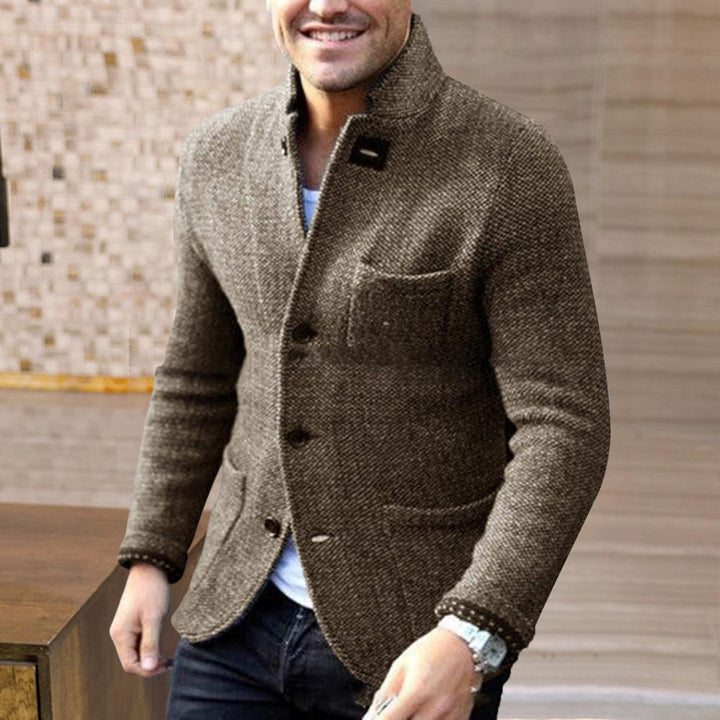 Stylish men's button-down casual jacket. Stand collar design, great for modern men's fashion & outerwear.