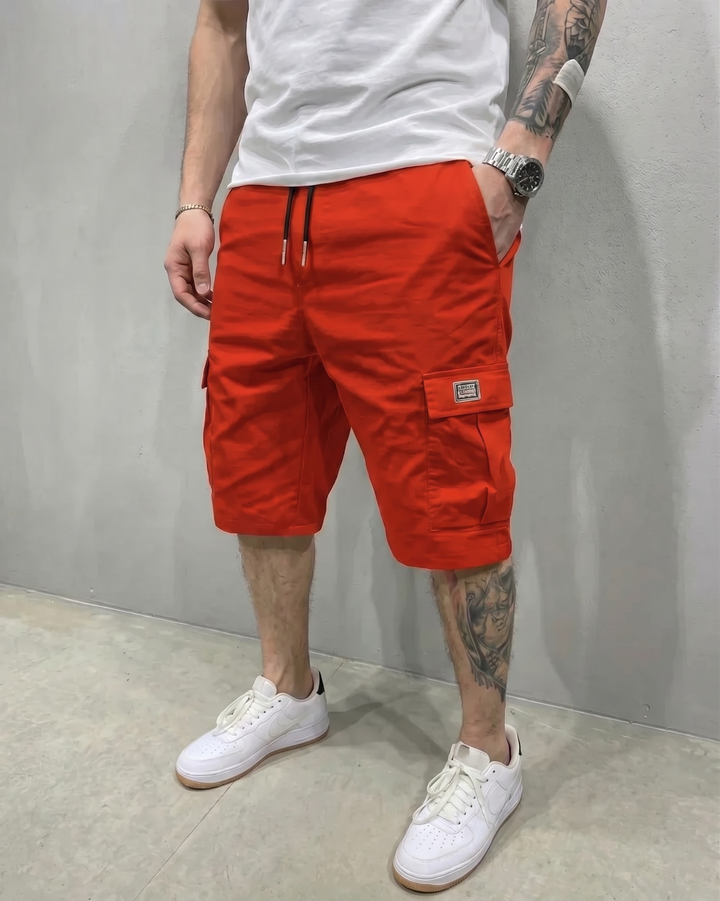 Men's cargo shorts with drawstring waist and flap pockets. Comfortable, relaxed fit for summer utility.