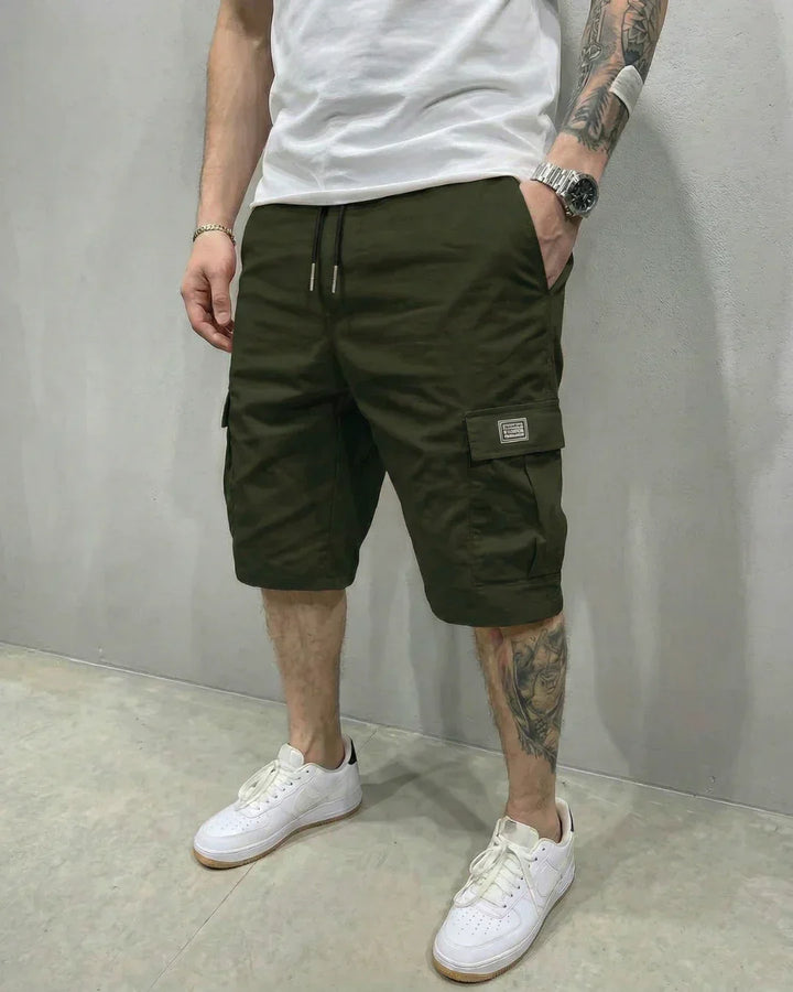 Casual men's cargo shorts with adjustable drawstring waist and practical flap pockets for everyday wear.