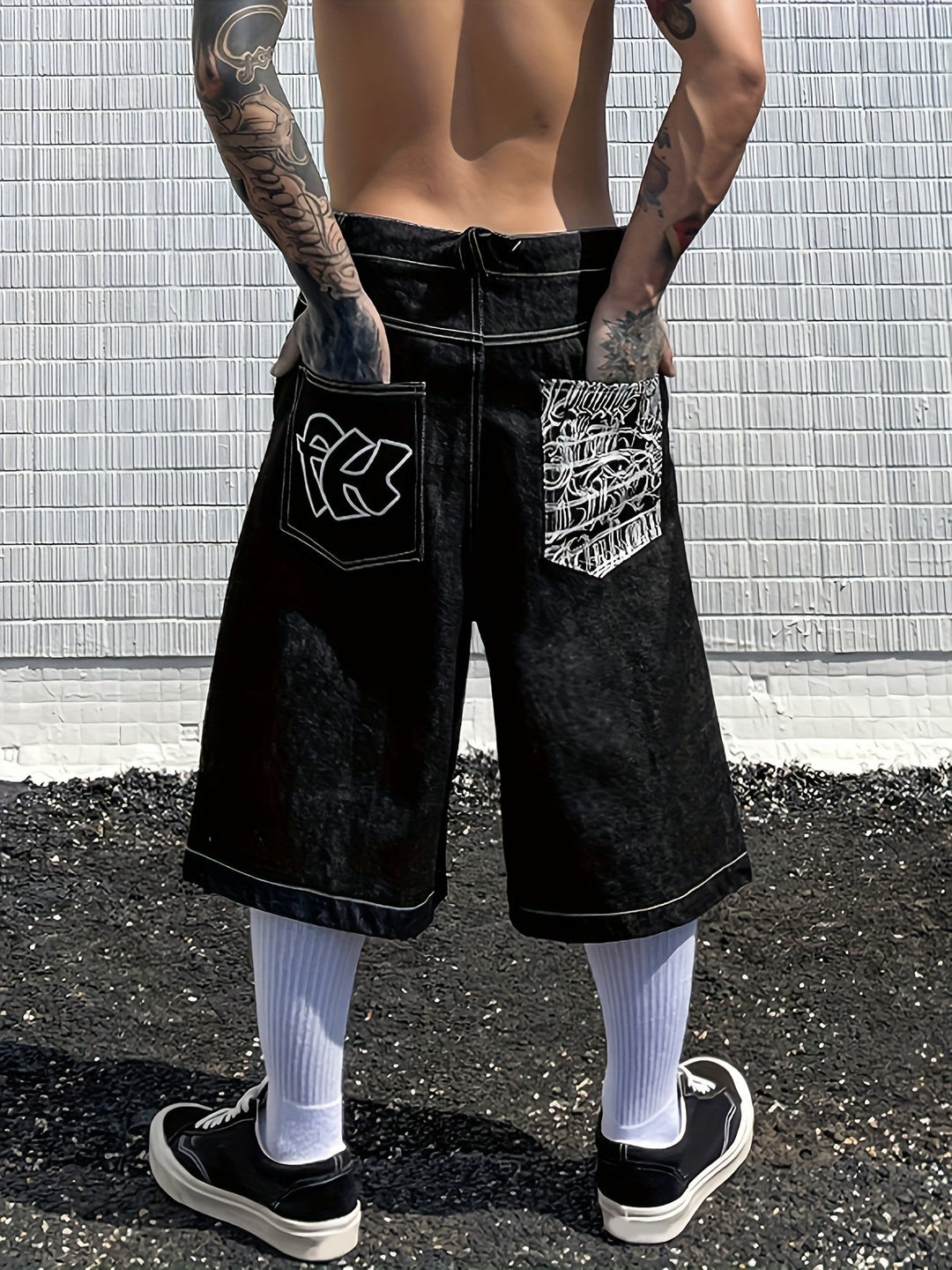 Men's blue denim bermuda shorts with colourful floral patterns