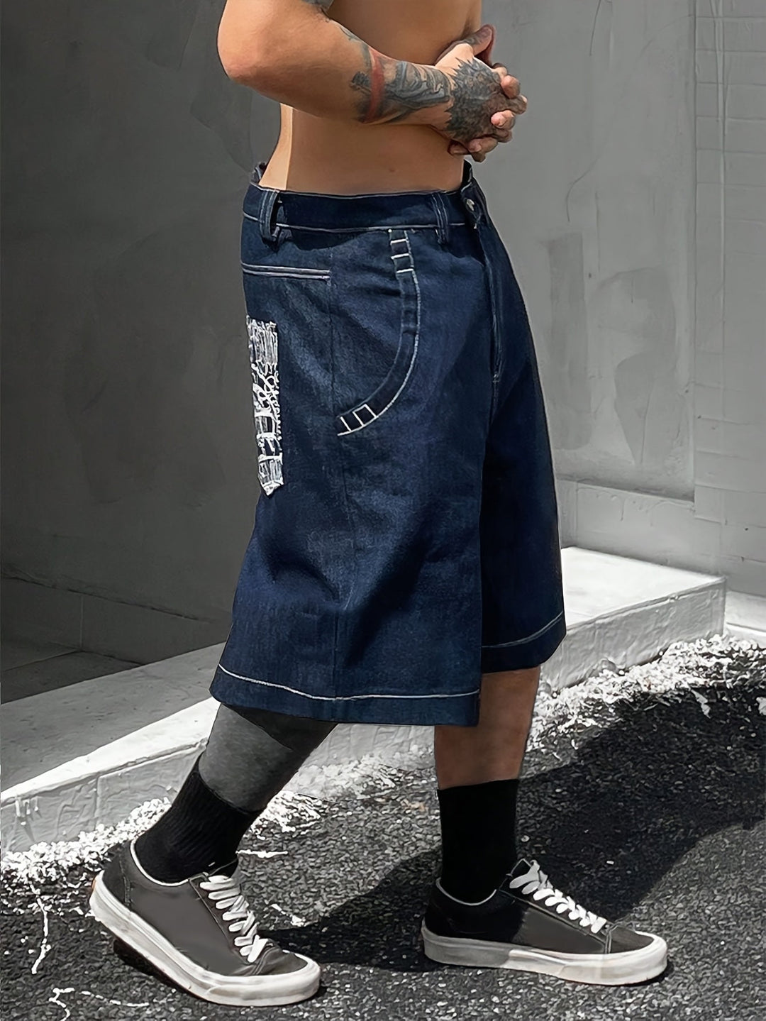 Summer fashion: Men's denim shorts with trendy floral embroidery