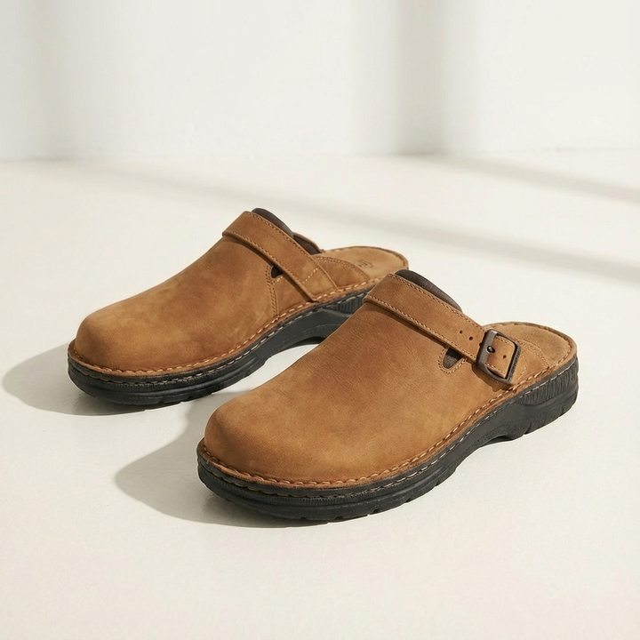 Side view of men's comfortable leather buckle strap clog slippers
