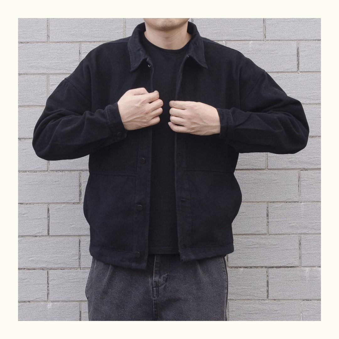 Comfortable men's oversized button-down jacket, ideal for versatile spring & fall layering.