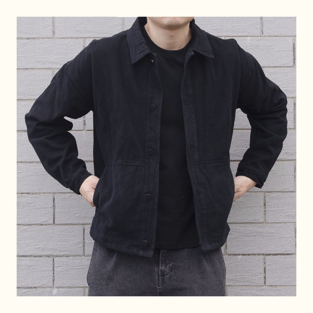 Man models a versatile men's button-down casual jacket, showcasing everyday style for spring and fall.