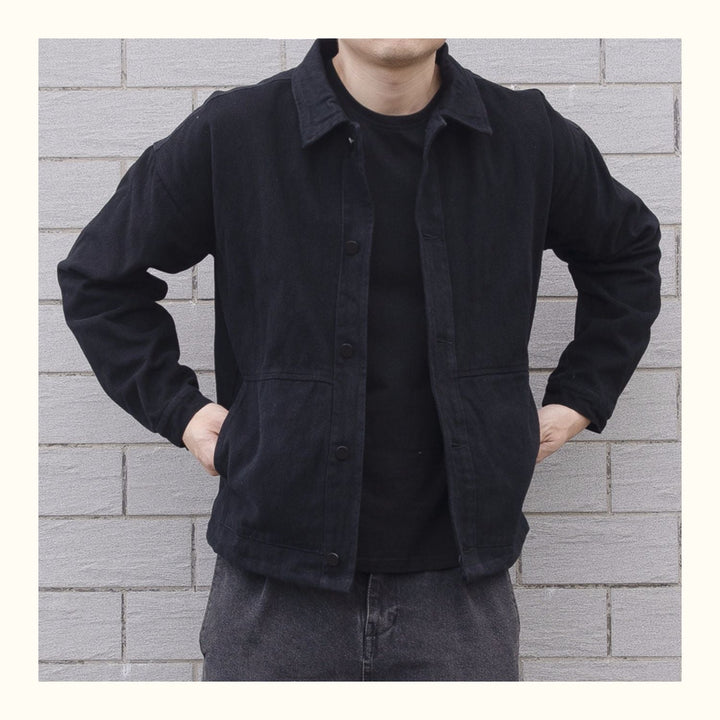 Man models a versatile men's button-down casual jacket, showcasing everyday style for spring and fall.