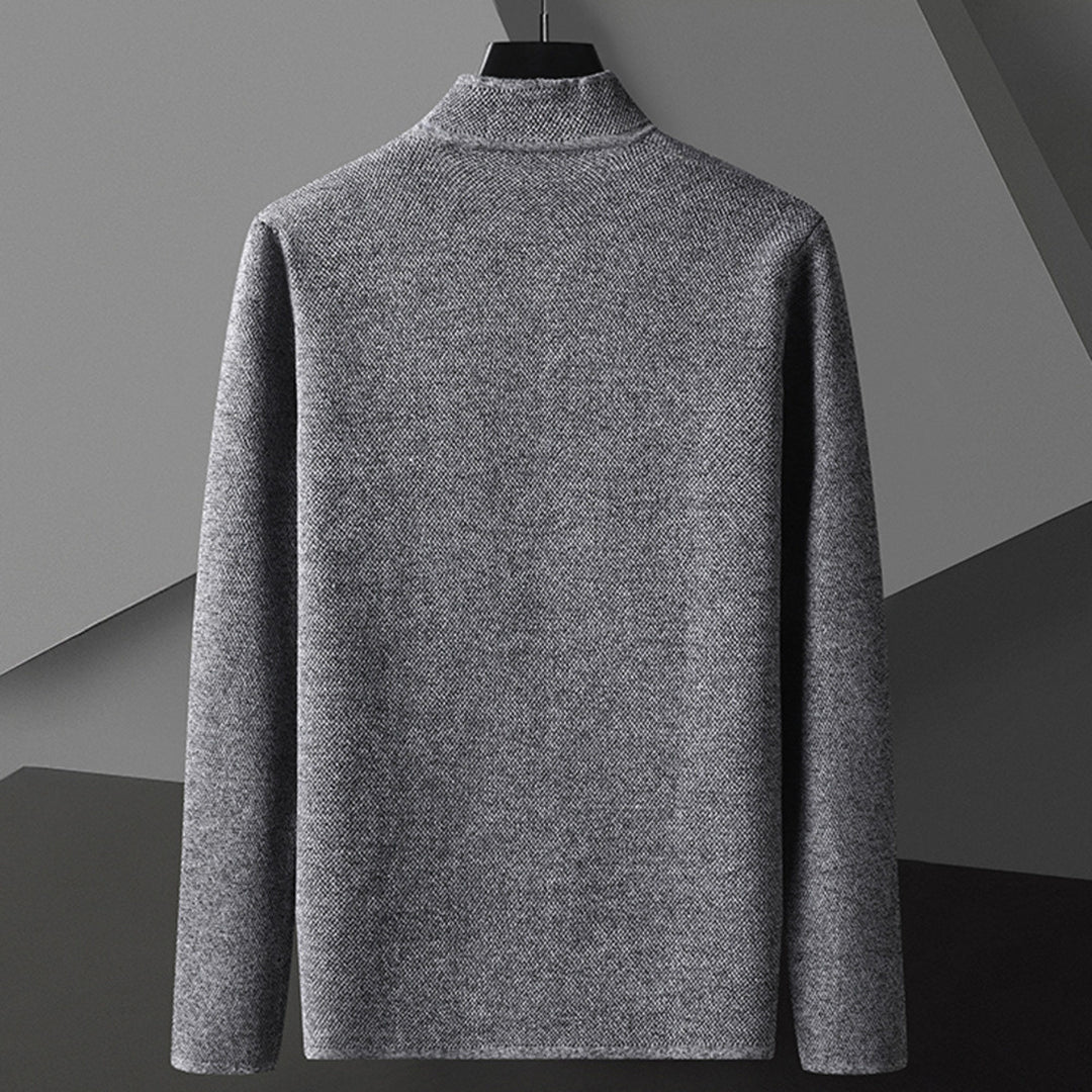 Relaxed fit men's outerwear featuring a unique mandarin collar and convenient button-down front.