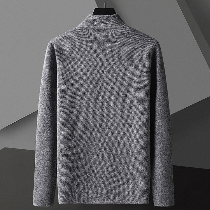 Relaxed fit men's outerwear featuring a unique mandarin collar and convenient button-down front.