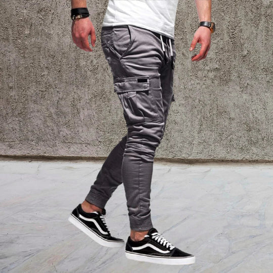 Straight leg men's cargo pants, new with handy flap pockets, great for casual and utility wear.
