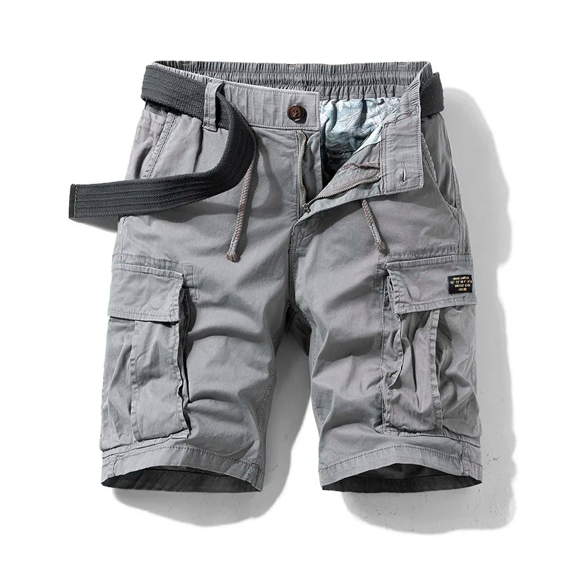 Men's relaxed fit cargo shorts with drawstring waist and ample pockets for casual warm weather style.