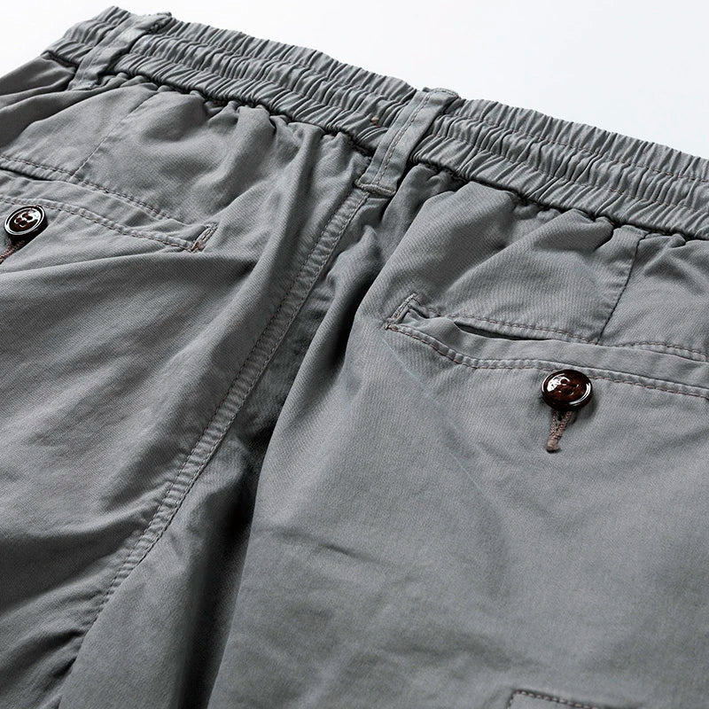 Black men's casual cargo shorts, featuring a comfortable drawstring waist & useful pockets for versatility.