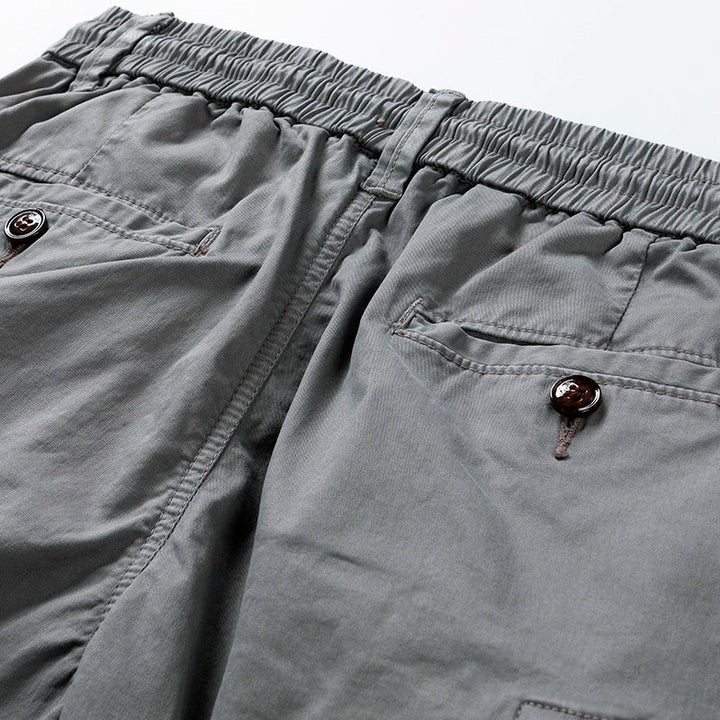 Black men's casual cargo shorts, featuring a comfortable drawstring waist & useful pockets for versatility.
