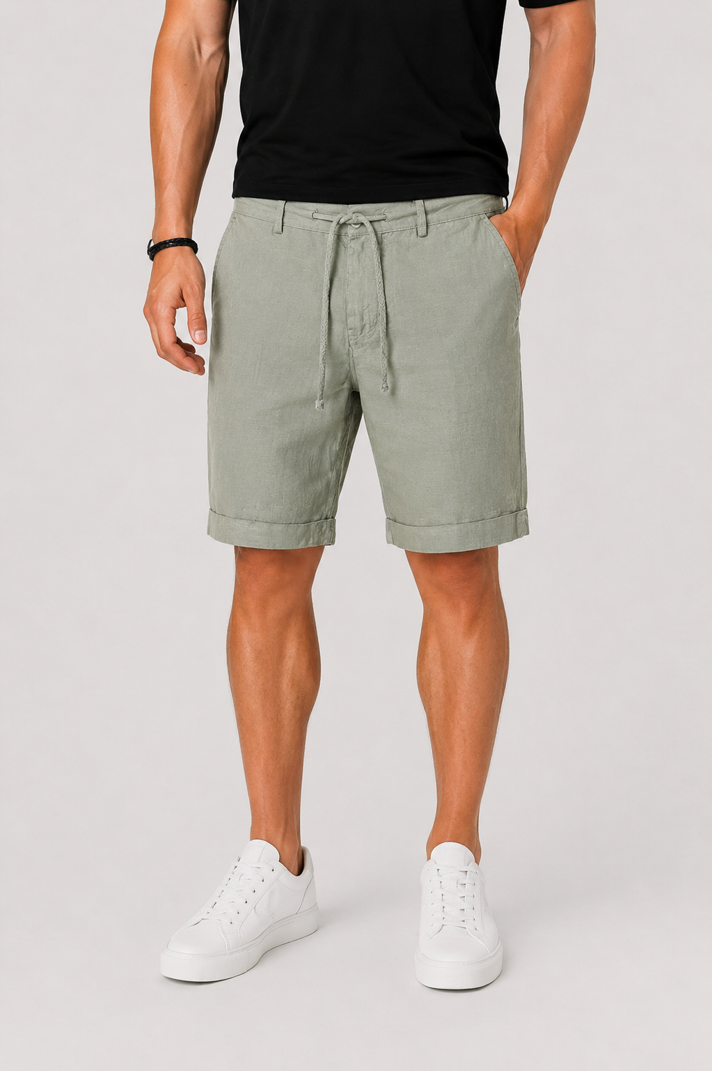 Classic men's chino shorts featuring a practical drawstring waist & fashionable rolled cuffs. Perfect for summer style.