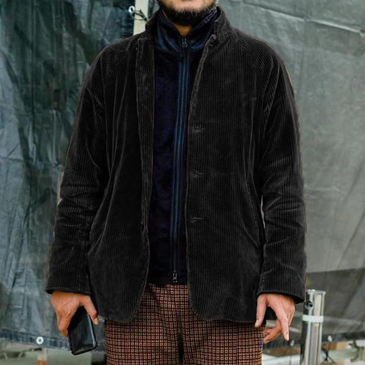 Stylish men's corduroy outerwear jacket with a classic button-up design, perfect for casual everyday style.
