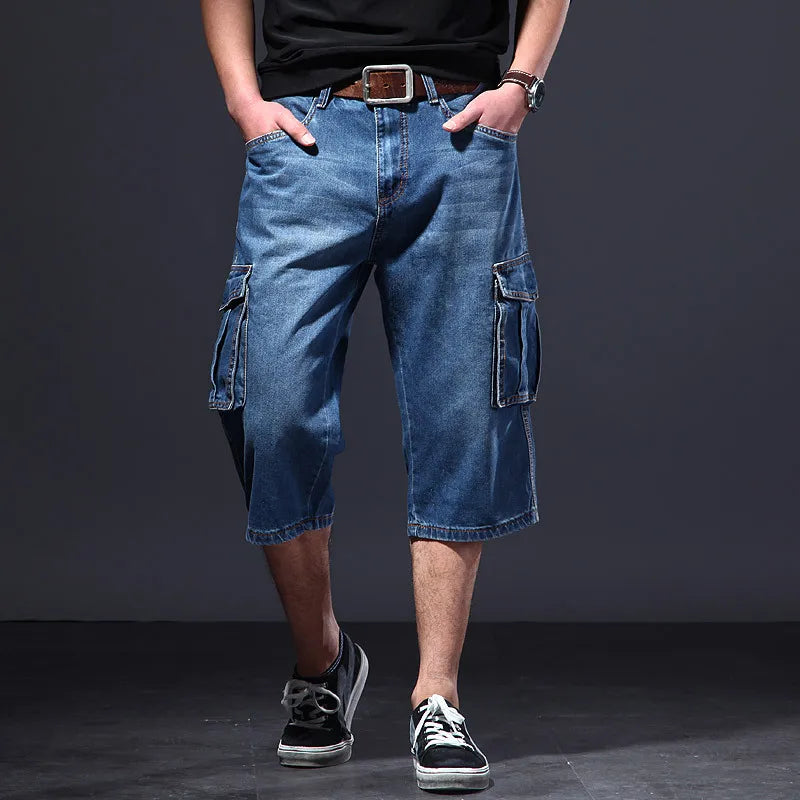 Men's casual denim cargo shorts, relaxed fit, with prominent side utility pockets, ideal for summer everyday wear.