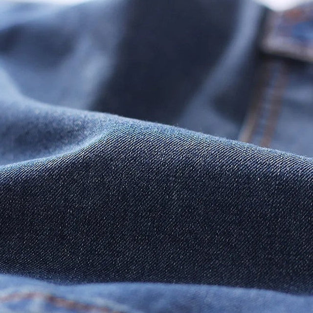 Full view of new men's casual denim cargo shorts, classic blue wash, with multiple utility and side pockets.