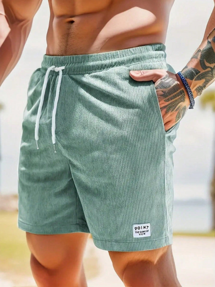 Everyday men's ribbed drawstring shorts. Comfortable, stylish, and perfect for casual summer activities or lounging.