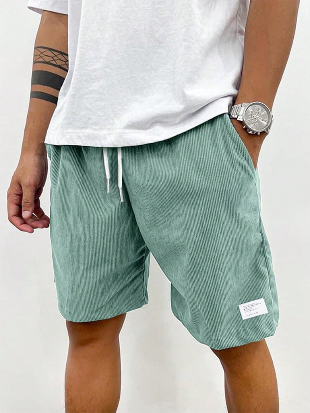 Grey men's drawstring ribbed shorts. Soft and comfortable loungewear, perfect for casual summer style.