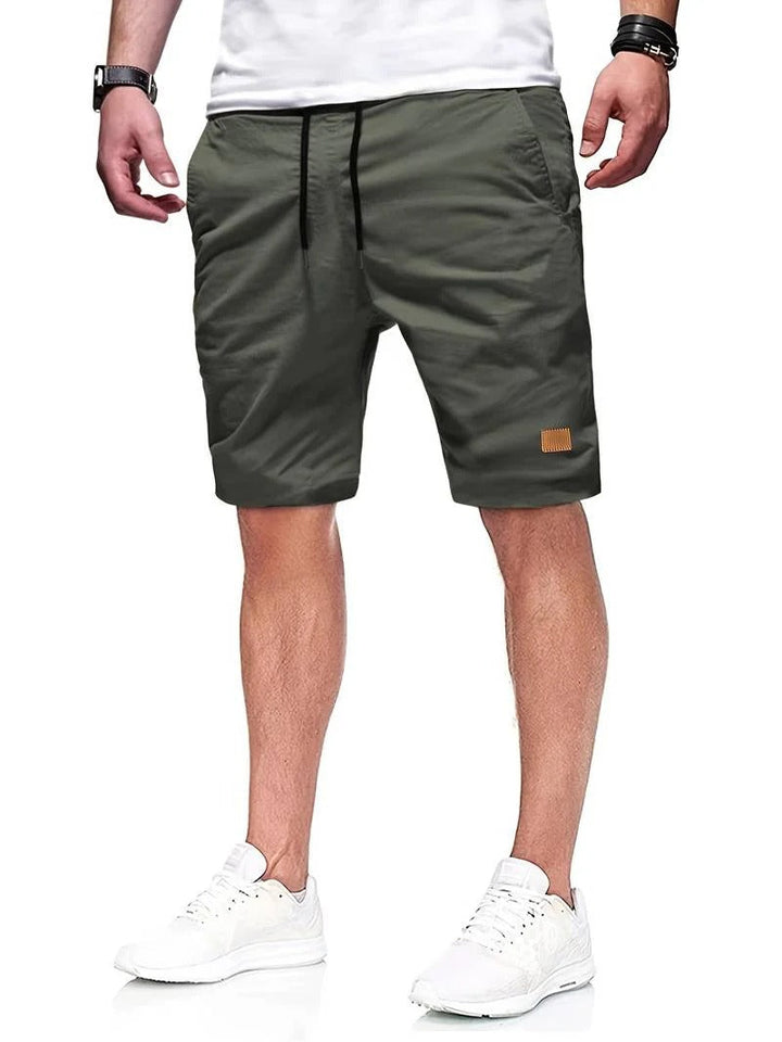 Lightweight men's drawstring shorts, perfect for summer athletic activities or lounging.