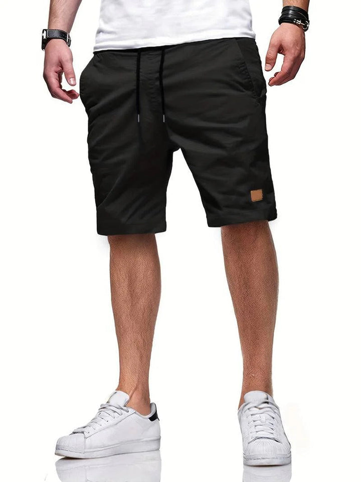 Soft men's comfort shorts with adjustable drawstring, great for relaxed summer wear.