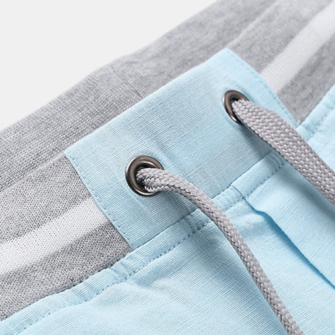 Men's comfortable elastic waist beach shorts, perfect for summer vacations & relaxed wear.
