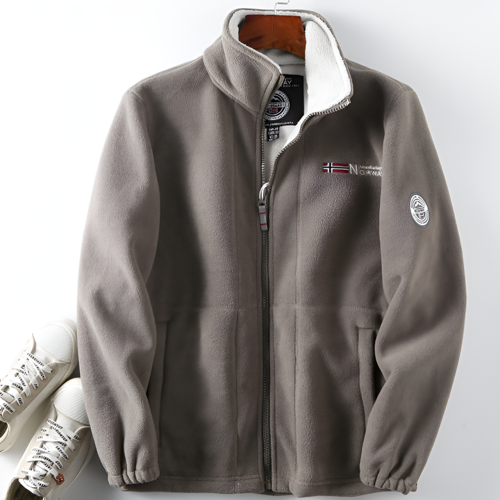 Stylish men's outdoor fleece jacket. Warm, breathable full-zip layer, perfect for hiking & casual winter fashion.