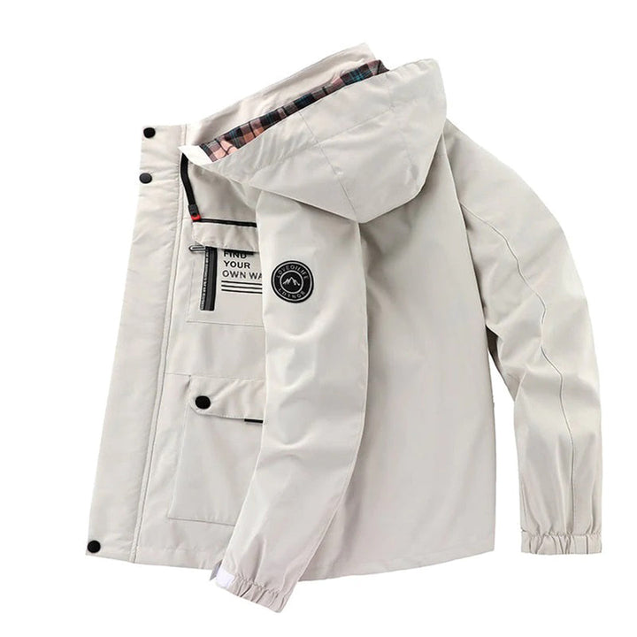 Multi-pocket men's hooded jacket, perfect for casual outdoor adventures & streetwear in spring/autumn.